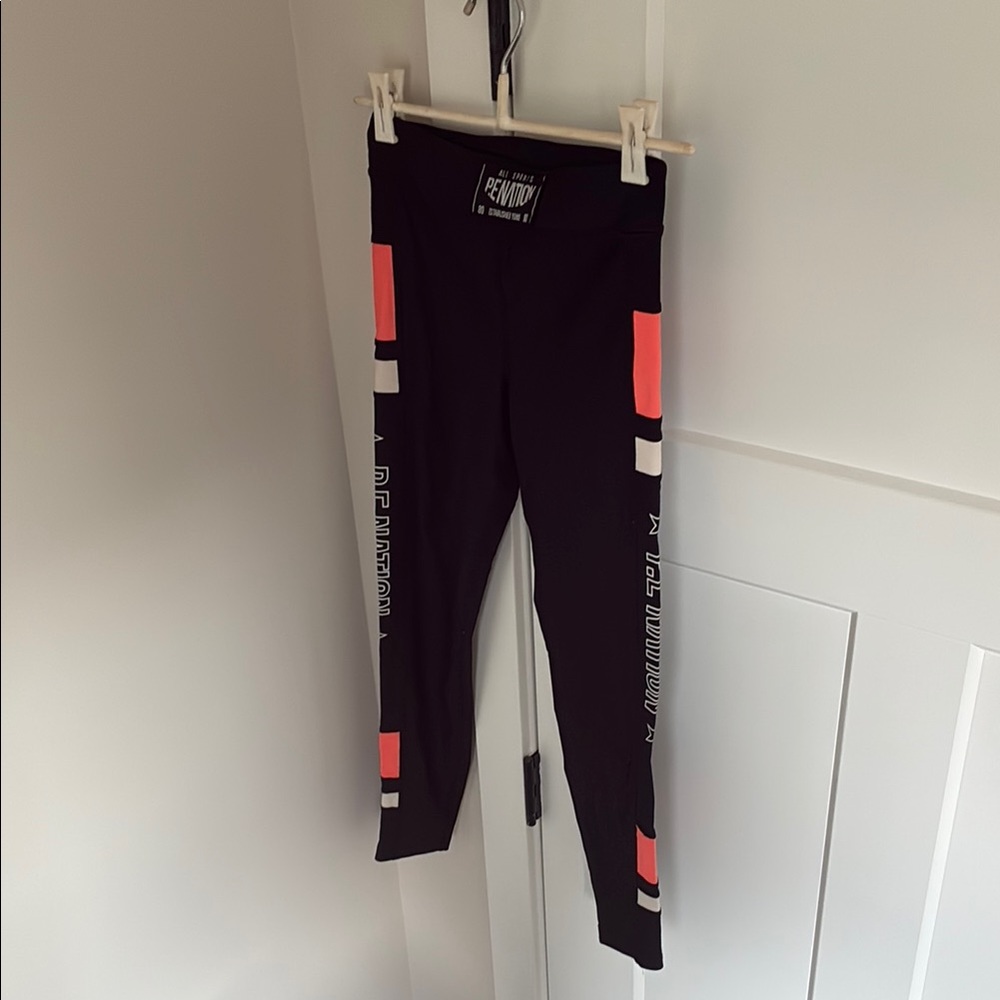 Black and Orange P.E. Nation Barry’s Bootcamp Leggings